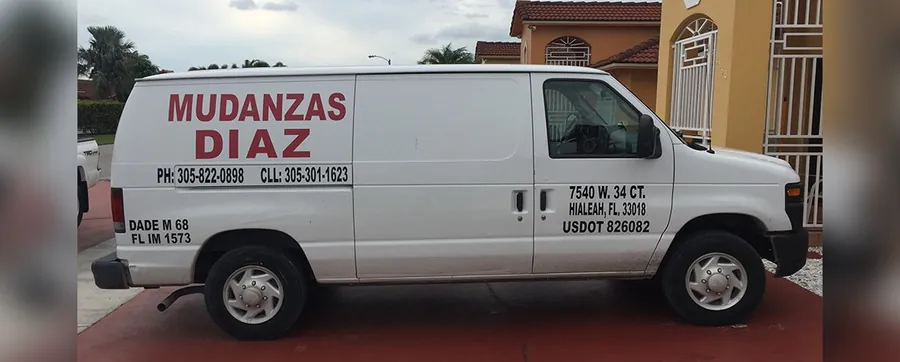 Mudanzas Diaz cargo van with company lettering and license numbers